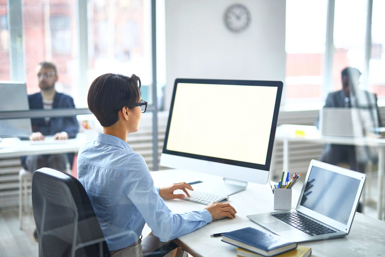 Woman by Computer